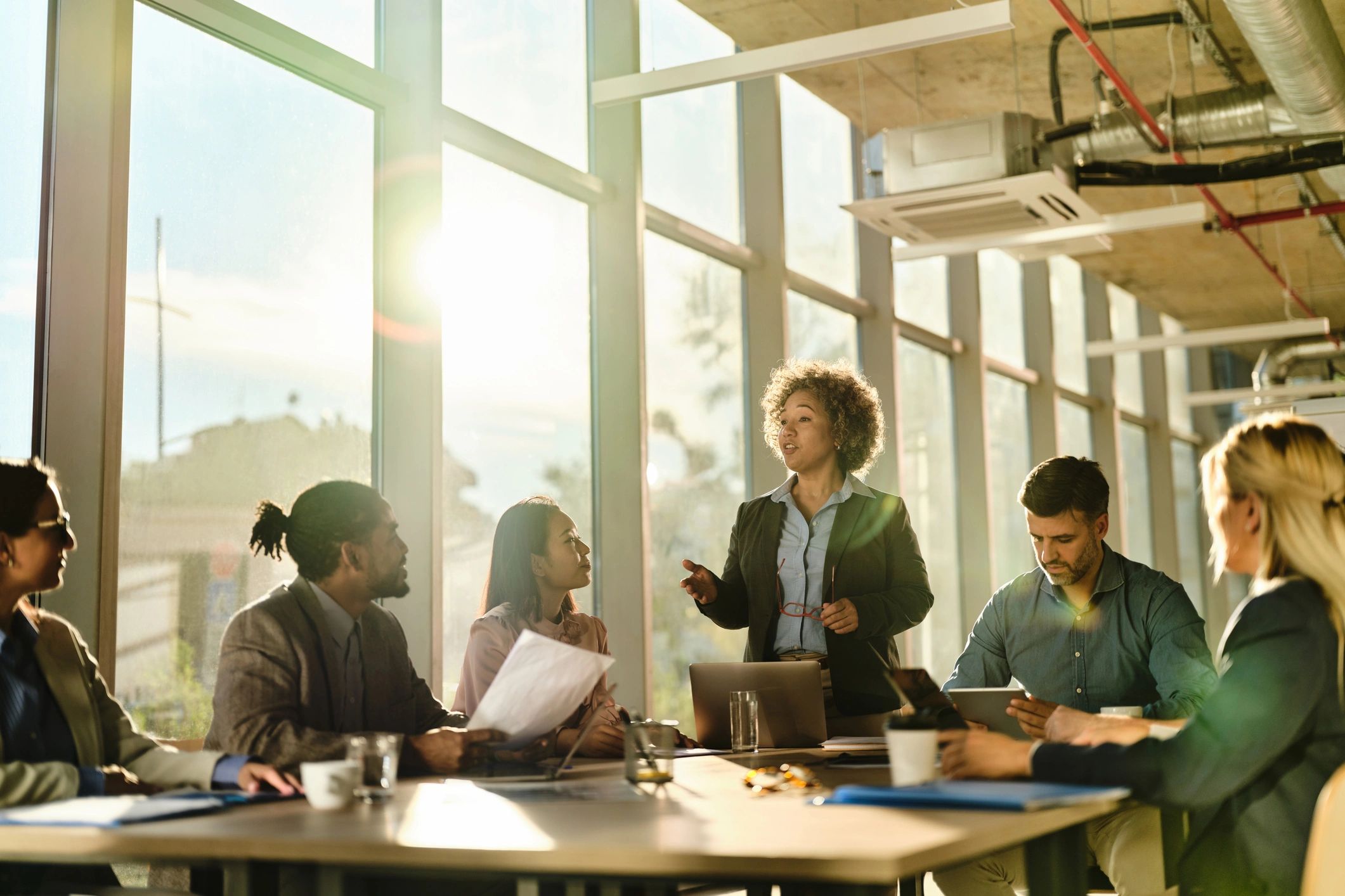 diverse news team in modern office